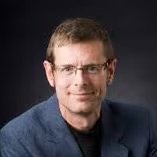 Portrait of Colin Funk, Creative Lead at Reframe Leadership
